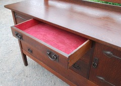 Detail original red "ooze" leather in top drawer.